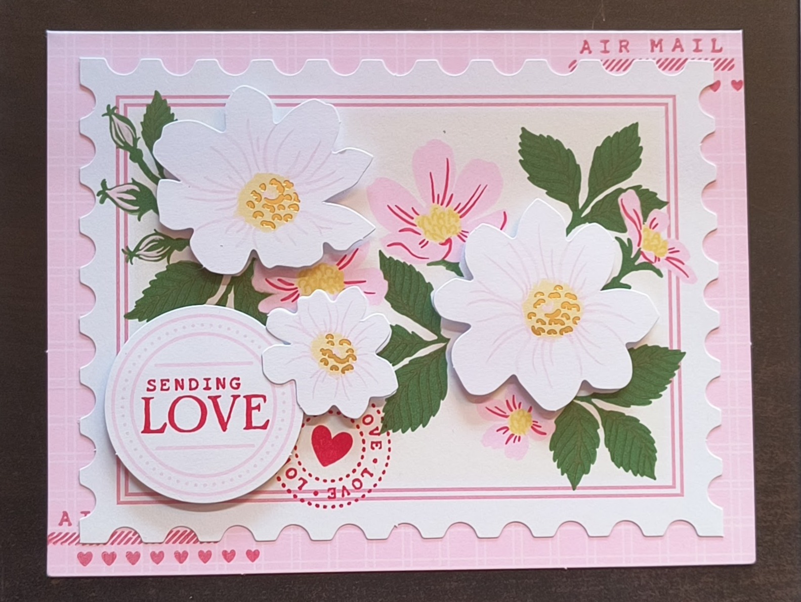 Sending Love on a floral and postage theme background